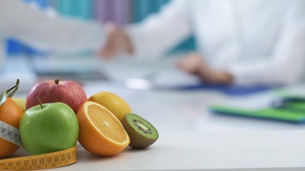 Wall Mural - Nutritionist working in the office