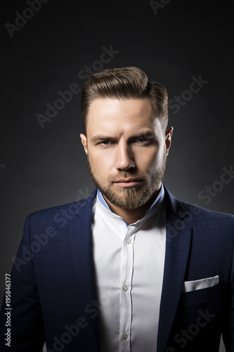 Handsome Young Man With Beard And Perfect Modern Hair Style