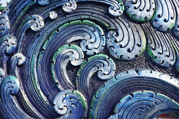 Closed-up of colorful wave  concrete stucco design in Thai temple