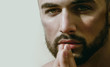Sexy bearded man looks at camera. Ask for help, trust and eyes. Portrait of young handsome guy with beard, green eyes and naked body. Homosexual or heterosexual young male model topless. Handsome