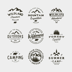 set of vintage wilderness logos. hand drawn retro styled outdoor adventure emblems. vector illustrat