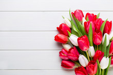 Springt Time. Red Tulip Bouquet On The White Wooden Background.