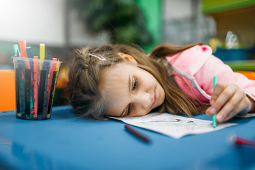 Wall Mural - Little girl asleep on playground