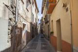 Fototapeta Na drzwi - Narrow street in village of Castellfollit de la Roca,Catalonia,Spain.