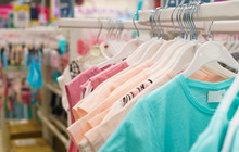 Children's Clothing In The Store. Dress For Girls