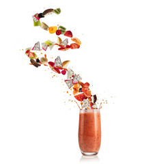 Fototapete - Smoothie drink with fruit flying ingredients