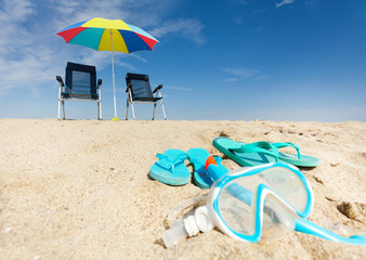 Wall Mural - Snorkeling mask with snorkel laying on white sand