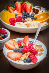 Wall Mural - breakfast with yogurt,strawberry rasperry and cereals 