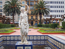 Girl With Amphora Fountain Statue In San Sebastian, Basque Country, Spain