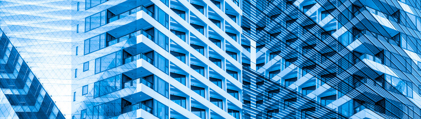 Architecture close up, windows of skyscraper. Glass and concrete. Urban landscape , City Business District. Modern abstract background. glass facades of modern of tall buildings and skyscraper.