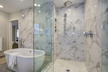 White and gray calcutta marble bathroom design