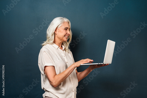 Cheerful Mature Old Woman Using Laptop Computer Buy This Stock