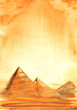Real Watercolor sketch of Egyptian Pyramids on a golden sandy sky. Hand drawn landscape background.
