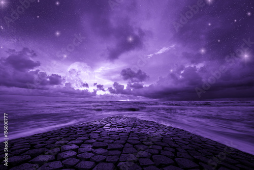 Fotomural Ultra violet fantasy background, road to the ocean with fantastic night sky, col