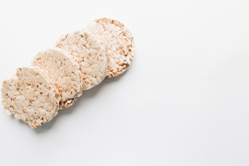 Crisp bread slices isolated over white background, healthy breakfast