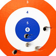 A target with bullet holes in it.