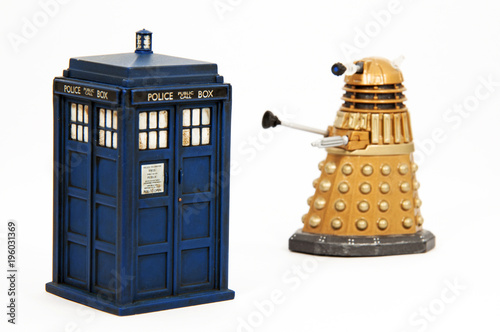 Toy models of a Tardis and Dalek similar to those in the popular TV series Dr Who Poster