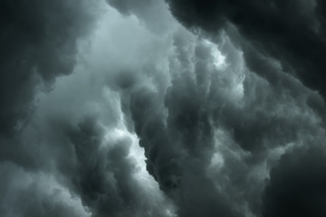 Wall Mural - dark clouds and thunderstorm with rainy, dramatic black clouds in summer