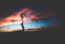 Acrobatics Silhouette In The Sunset Yoga