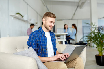 Sticker - smiling man with laptop working at office