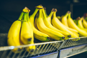 Wall Mural - bananas branch on shelf of store