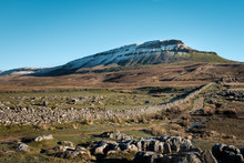 View On Snowcapped Pen-y-Ghent In North Yorkshire