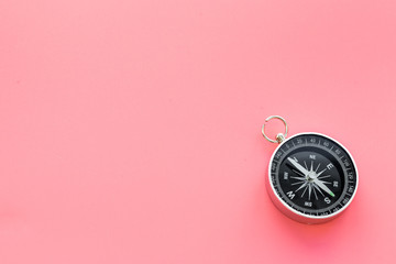 Wall Mural - Direction concept with compass on pink background top view mockup