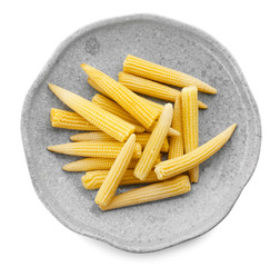 Poster - Plate with fresh young baby corn on white background