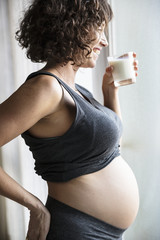 Poster - Pregnant woman drinking milk