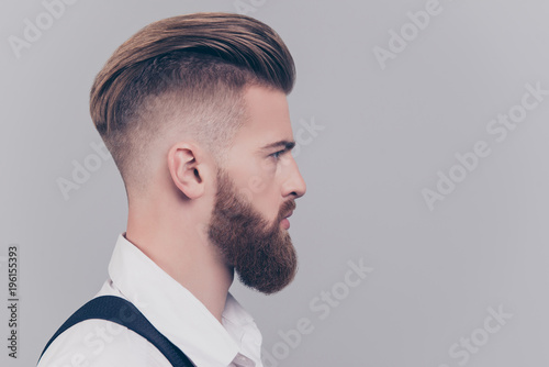 Cuadros en Lienzo Half-faced portrait of serious concentrated confident brutal chic handsome attra