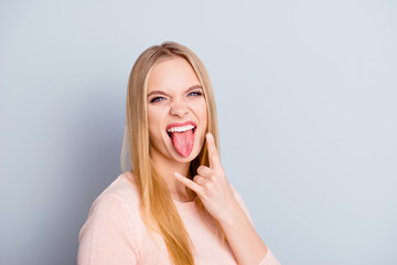 Wall Mural - Trendy style positivity cool people person party celebrate carefree concept. Close up portrait of attractive restless crazy smooth hairdo teenage girl demonstrating horns isolated on gray background