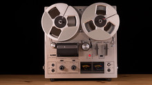 Vintage Reel To Reel Tape Recorder Playing Music 