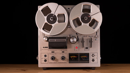 Vintage Reel to Reel tape recorder playing music 