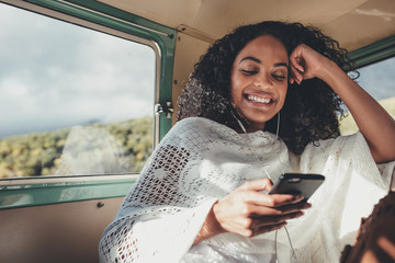 Woman enjoying on her road trip