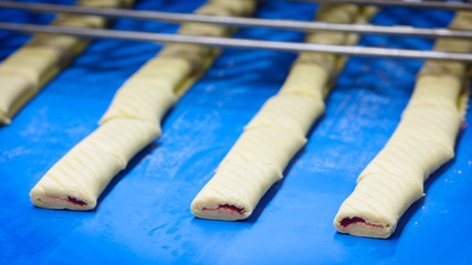 Poster - Bars cakes buns cookies on production line background, Dessert, sweets for tea. Fattening sweets concept