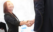 © ASDF - business colleagues shaking hands after a successful presentation.