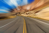 Fototapeta Natura - Arches National Park highway with motion blur
