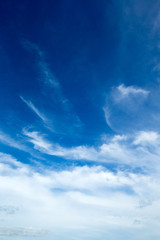 Wall Mural - blue sky background with tiny clouds