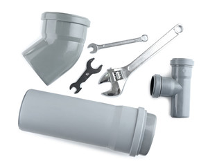 Poster - Plumber's items on white background