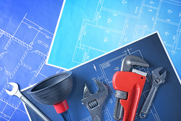 Wall Mural - Plumber's tools on blueprint