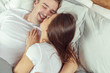 © fotofabrika - beautiful couple lying together on the bed