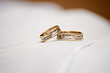 © Lukas - Two isolated golden wedding rings on white background