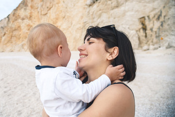 Wall Mural - Laughing Mother Holding Son