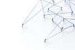 © ink drop - A large grid of pins connected with string. Communication, technology, network concept