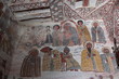 TIGRAY REGION, ETHIOPIA - February 06, 2018: wall murals of saints and iconographic scenes, painted in naive african christian style, on wall of Yohannes Meaquddi church