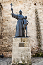 The Statue Of Fray Junipero Serra On The Plaza De San Francisco In Front Of The Basilica In Havana, Cuba