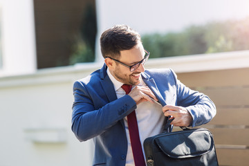 Wall Mural - Businessman taking phone