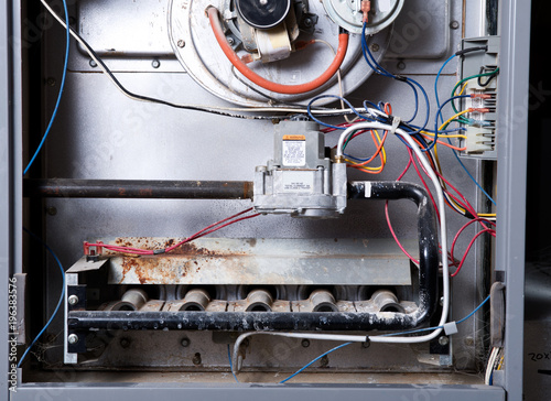 Fotomural Open home furnace just ready for cleaning and repair