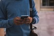 © Wavebreak Media - Businessman using mobile phone outside 4k