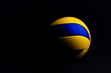 Wall Mural - volleyball ball isolated on black background.